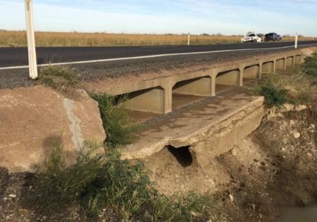 Post event photo of road and culverts undermined by the event 